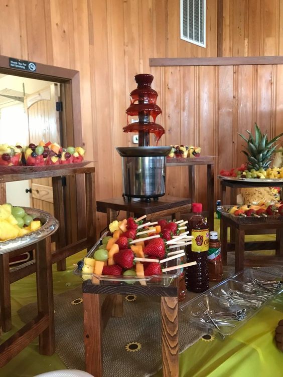 A table with a bunch of fruit on it, featuring a brunch of Mexican cuisine