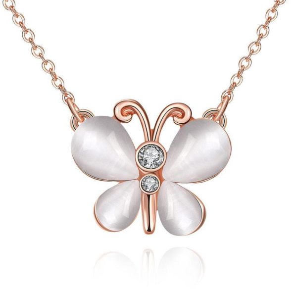 A quinceanera necklace with a white butterfly pendant adorned with a diamond