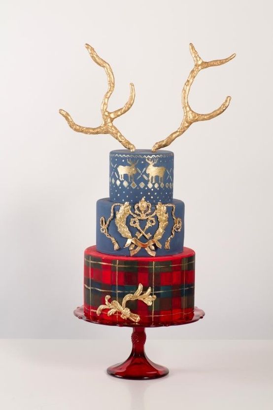 Quinceanera cake: A three-tiered tartan cake with a deer head on top