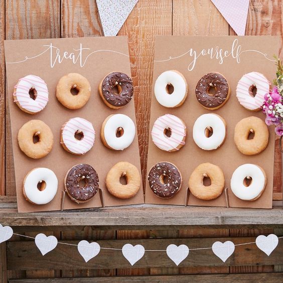 Quinceanera doughnut wall with Ginger Ray Gold Foiled Treat Yourself Donut Wall Party Display, featuring 9 doughnuts and a couple of cards with donuts on them