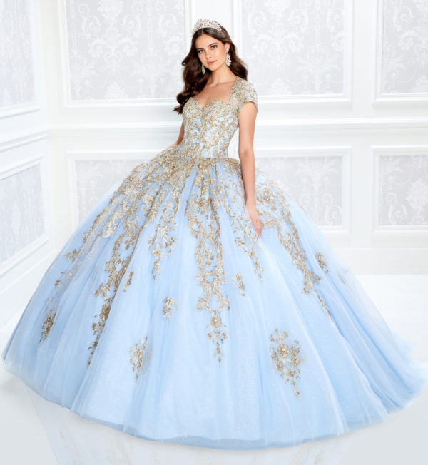 Quinceanera dresses with short sleeves, a woman in a blue and gold ball gown
