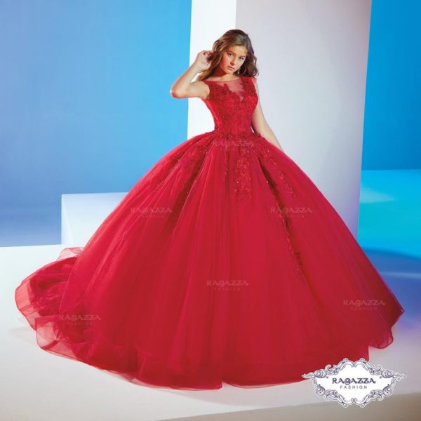 Quinceañera dresses, a woman in a red ball gown posing for a picture in a red theme quince dress
