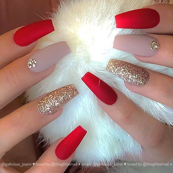 Quinceanera: A woman with red and gold nails holding a white fluffy ball on a red matte coffin