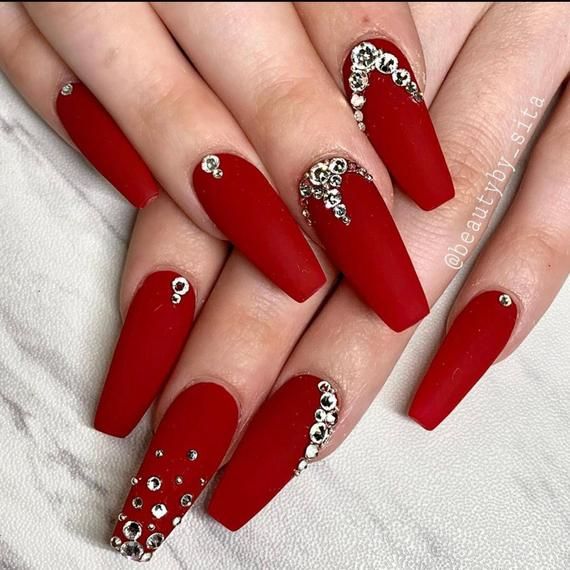 Quinceanera nail designs, a close up of a person's nails with red nail polish in 2023