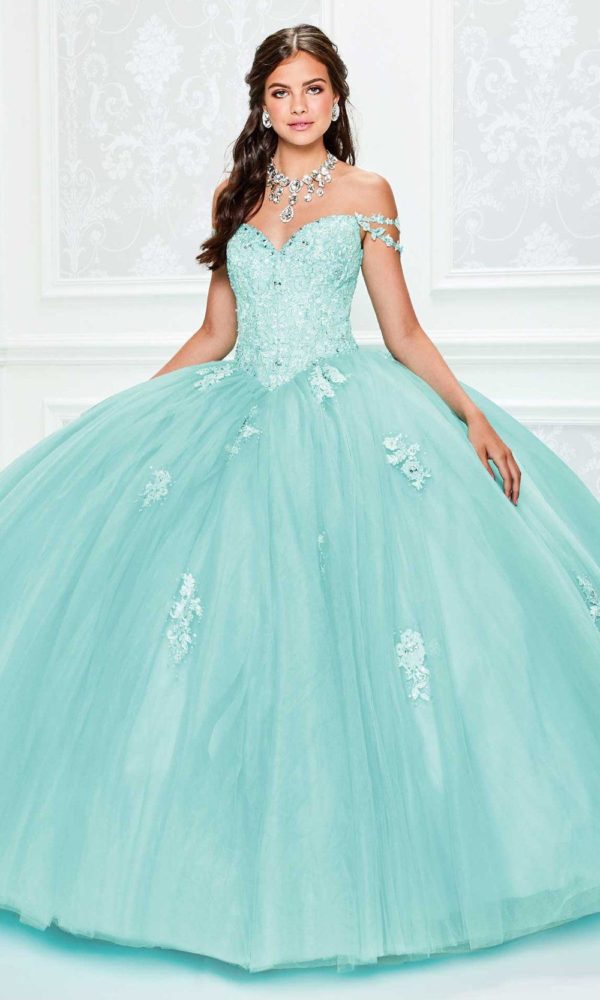 Teal and light blue quinceanera dresses, a woman in a light blue ball gown