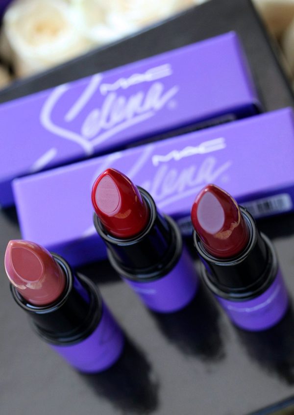 A close up of three lipsticks on a table for a Quinceanera