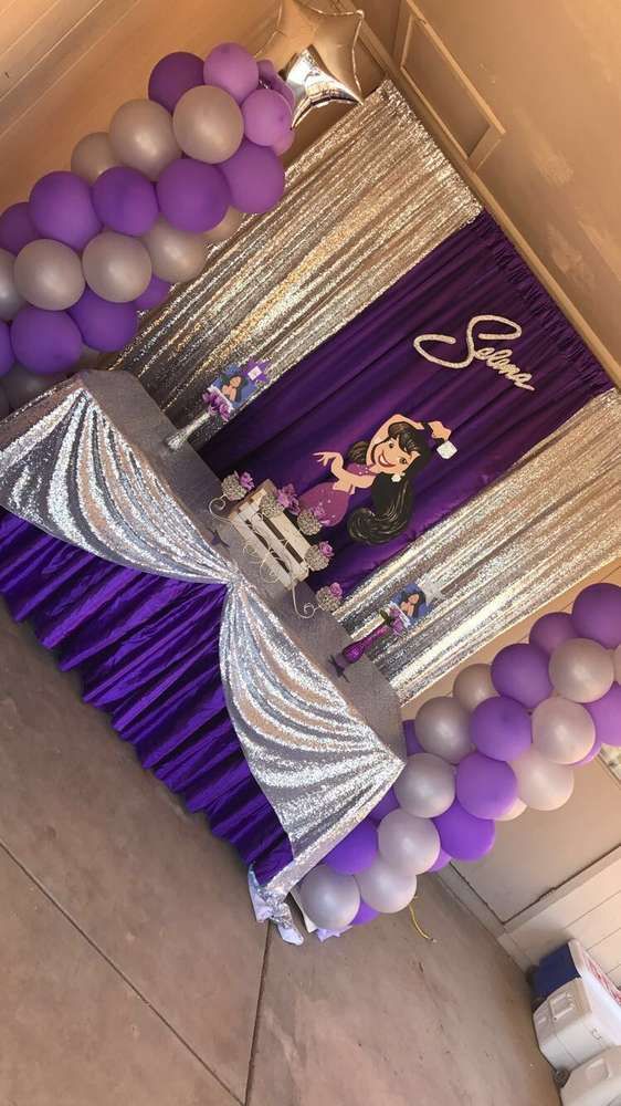 A purple and silver Quinceanera birthday party with balloons celebrating Selena