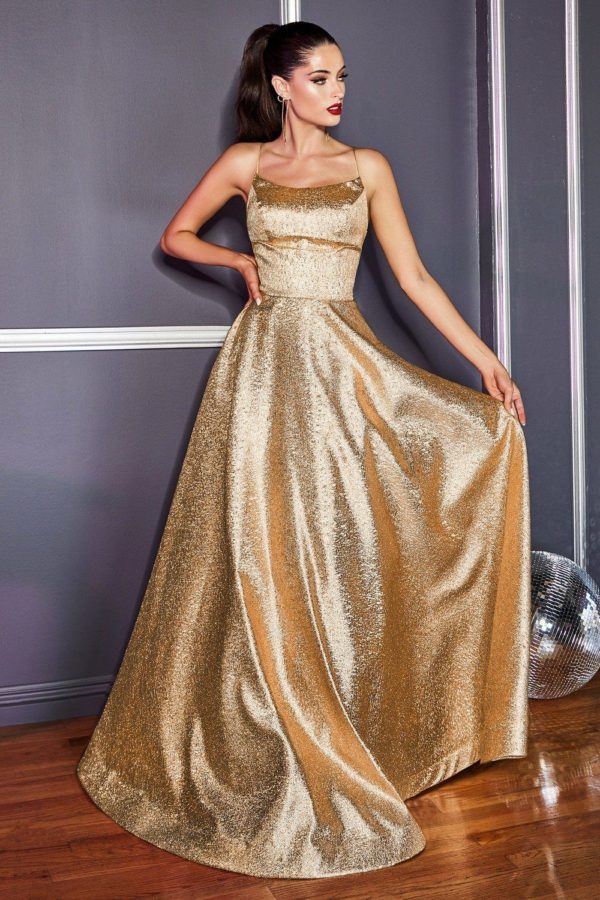 Quinceanera fashion model Dress, a woman in a gold dress standing in a room