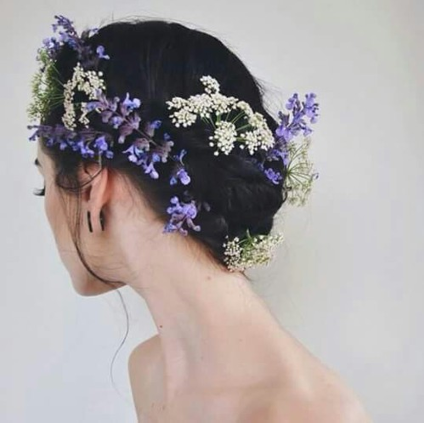 A Quinceanera image of Silena Beauregard with a flower crown on her head, reflecting aesthetics.