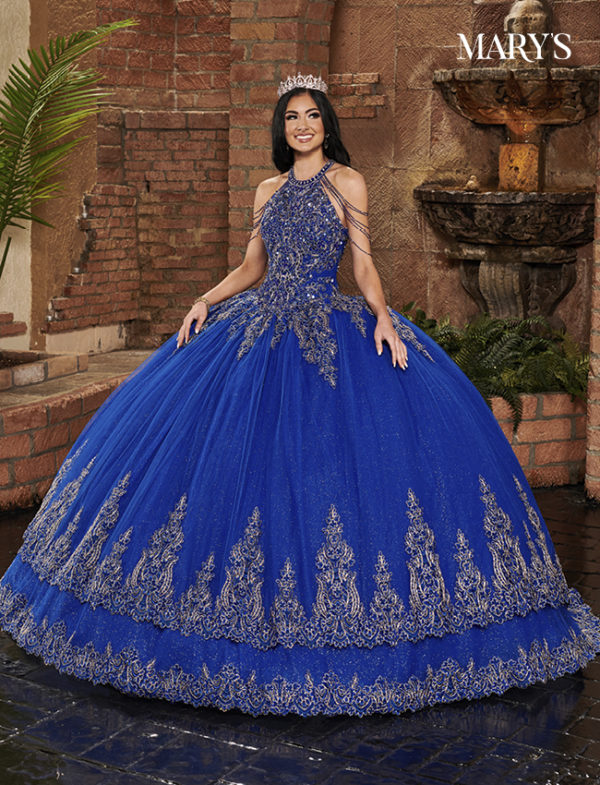 Quinceanera Dress, a woman in a blue ball gown posing for a picture at an October Quinceanera