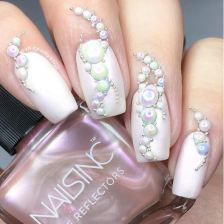 A person holding a bottle of nail polish for a Quinceanera