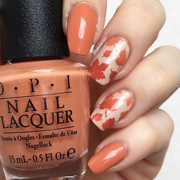 A picture of autumn leaf nails: nail art, a person holding a bottle of nail polish for Quinceanera