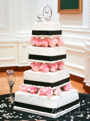 Quinceanera cake, a three tiered cake with pink roses