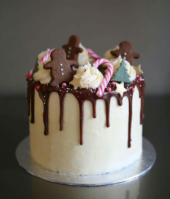 A beautiful Quinceanera cake with buttercream icing and Christmas drip decorations on top