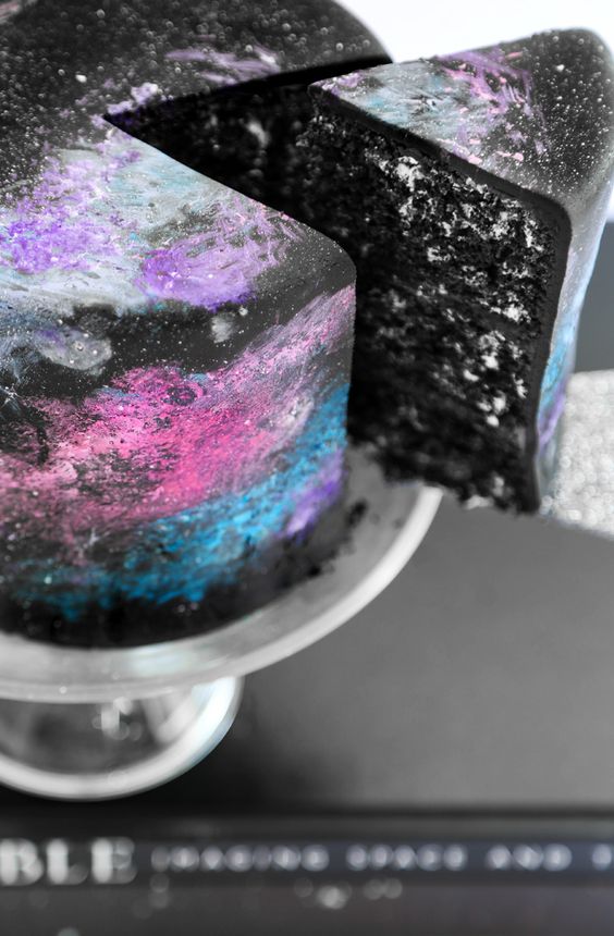 A Quinceanera cake with a slice taken out of it, made of chocolate