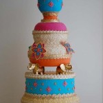 Quinceanera themed Hindu party with a three-tiered cupcake cake featuring a bird on top