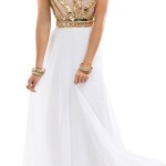 A woman in a white and gold Quinceanera gown dress
