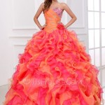 Quinceanera gown, a woman in a pink and orange dress