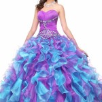 A woman in a purple and blue Quinceañera dress