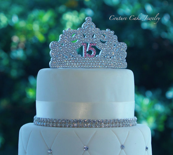 Quinceanera cake, a white cake with a crown on top