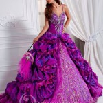 Quinceanera gown - A woman in a purple dress is posing for a picture