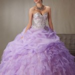 Gown Quinceañera dresses, a woman in a purple dress posing for a picture