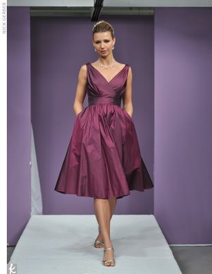 Quinceañera, a woman walking down a runway wearing a purple dress, with outfit para mama de Quinceañera