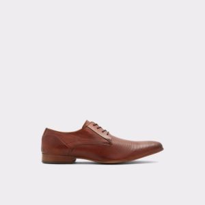 A pair of tan Men's Dress Shoes on a white background