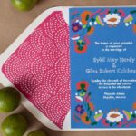 A colorful Quinceanera invitation with limes and flowers