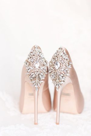 Quinceanera image of a pair of nude colored high heels with crystal detailing