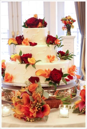 Quinceanera Invitation, a Quinceanera cake with flowers and candles on a table, with an orange and burgundy theme