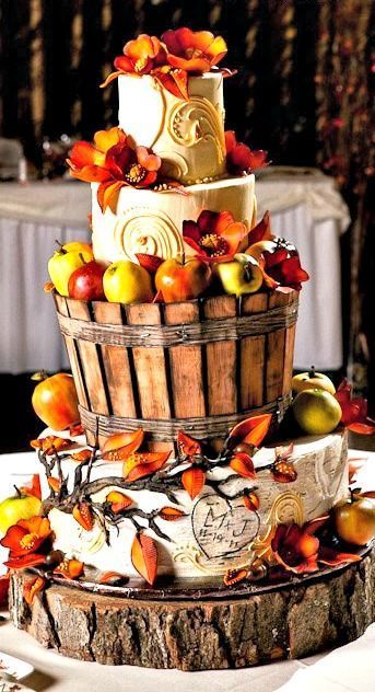 An amazing Quinceanera-themed autumn cake. The three-tiered cake is adorned with apples and leaves.