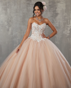 Neutral quince dress Quinceañera dresses, a woman in a ball gown posing for a picture