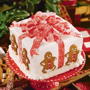 Quinceanera cake, a Christmas gift box cake decorated with gingerbreads and a bow