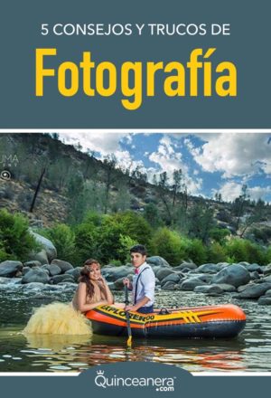A Quinceanera couple enjoy a peaceful boat ride on a river surrounded by nature.