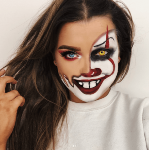 Quinceanera photo of Pennywise, a woman with clown makeup on her face