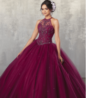 A woman in a red ball gown posing for a picture, wearing a Quinceañera dress with good colors for a Quinceanera