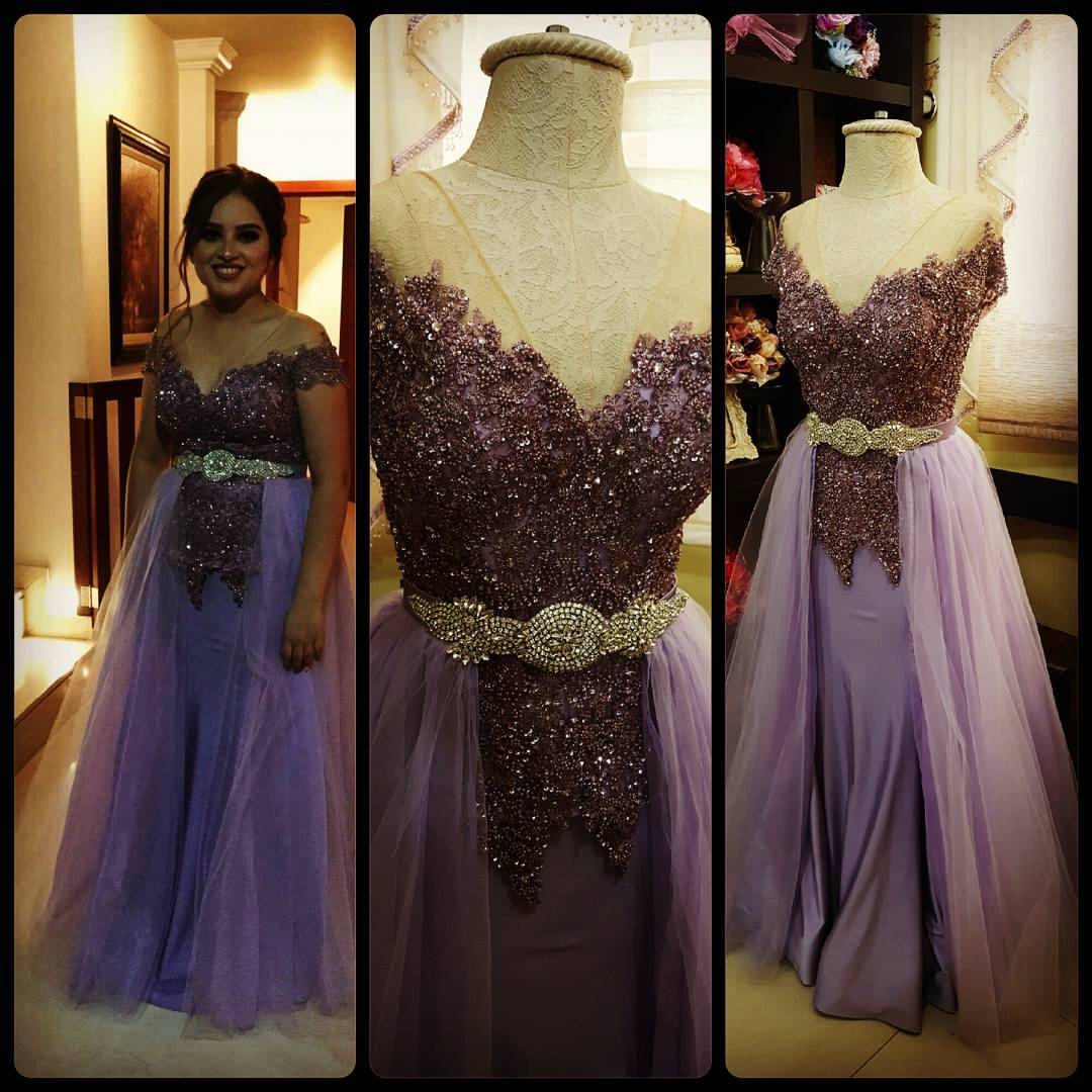 Quinceanera gown, a woman standing next to a dress on a mannequin