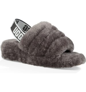 A pair of black fluff yeah Uggs slippers with a logo on them, perfect for a Quinceanera.