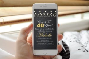 A person holding a cell phone in their hand, using the Quinceanera mobile app