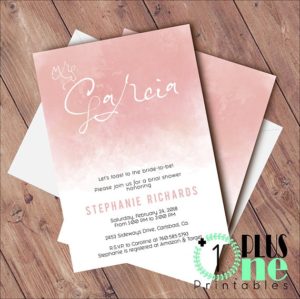 Quinceanera invitation, a pink and white Quinceanera invitation on a wooden table