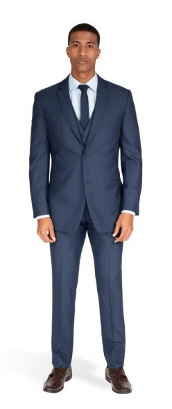 A man wearing a Ted Baker Jay trim fit blue suit with a tie