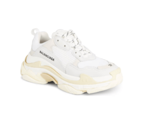 A close up of a white sneaker on a white background, perfect for Quinceanera.