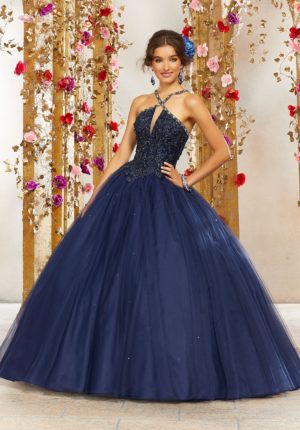 Quinceañera dresses, a woman in a blue dress posing for a picture, colores de vestidos para 15 años