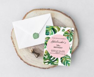 Quinceanera invitation: a pink and green invitation with a white envelope