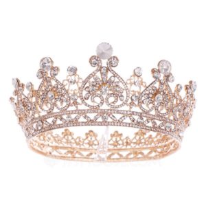A Quinceanera tiara with diamonds and pearls on a white background