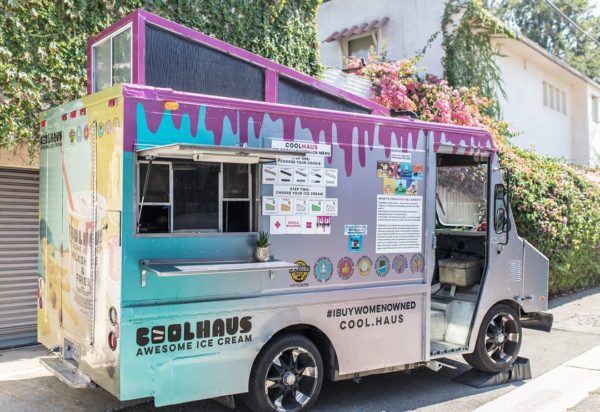 A Quinceanera-themed coolhaus truck selling ice cream, parked on the side of the road