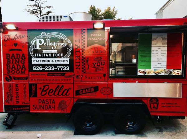 Quinceanera themed: A red food truck parked on the side of the road