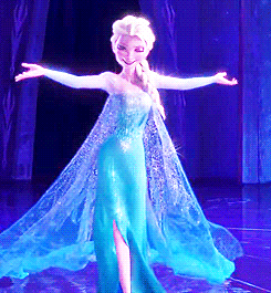 A woman in a blue dress on a stage, from the Disney Channel movie Frozen